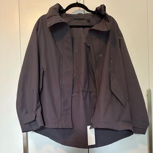 Medium purple/gray rain jacket size medium $70 mew with tags Uniqlo